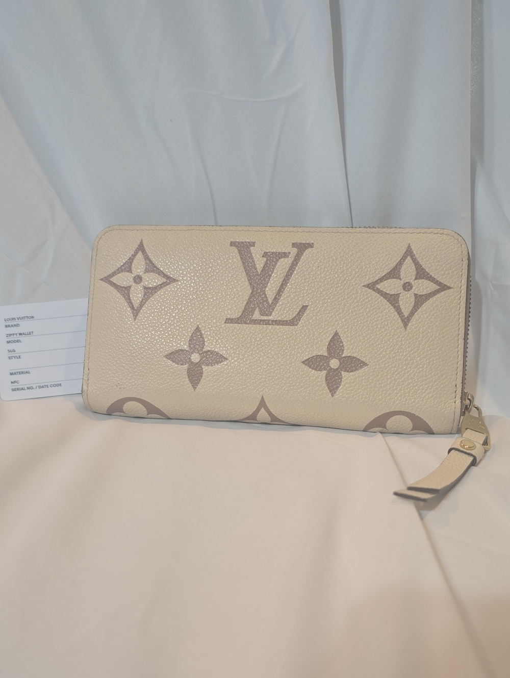 Authentic Louis Vuitton Empreinte Monogram Zippy Wallet - Cream/Tan Microchipped